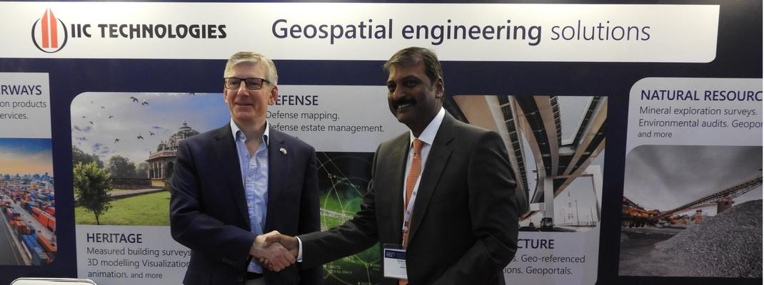 Ordnance Survey International and IIC Technologies signing an MoU